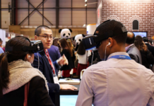 students wear VR headsets at a VR conference the