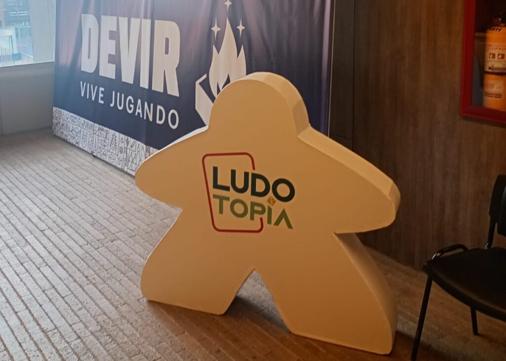 Ludotopia event in Bogotá, Colombia 2025. Picture shows a giant meeple and Devir branding in the background